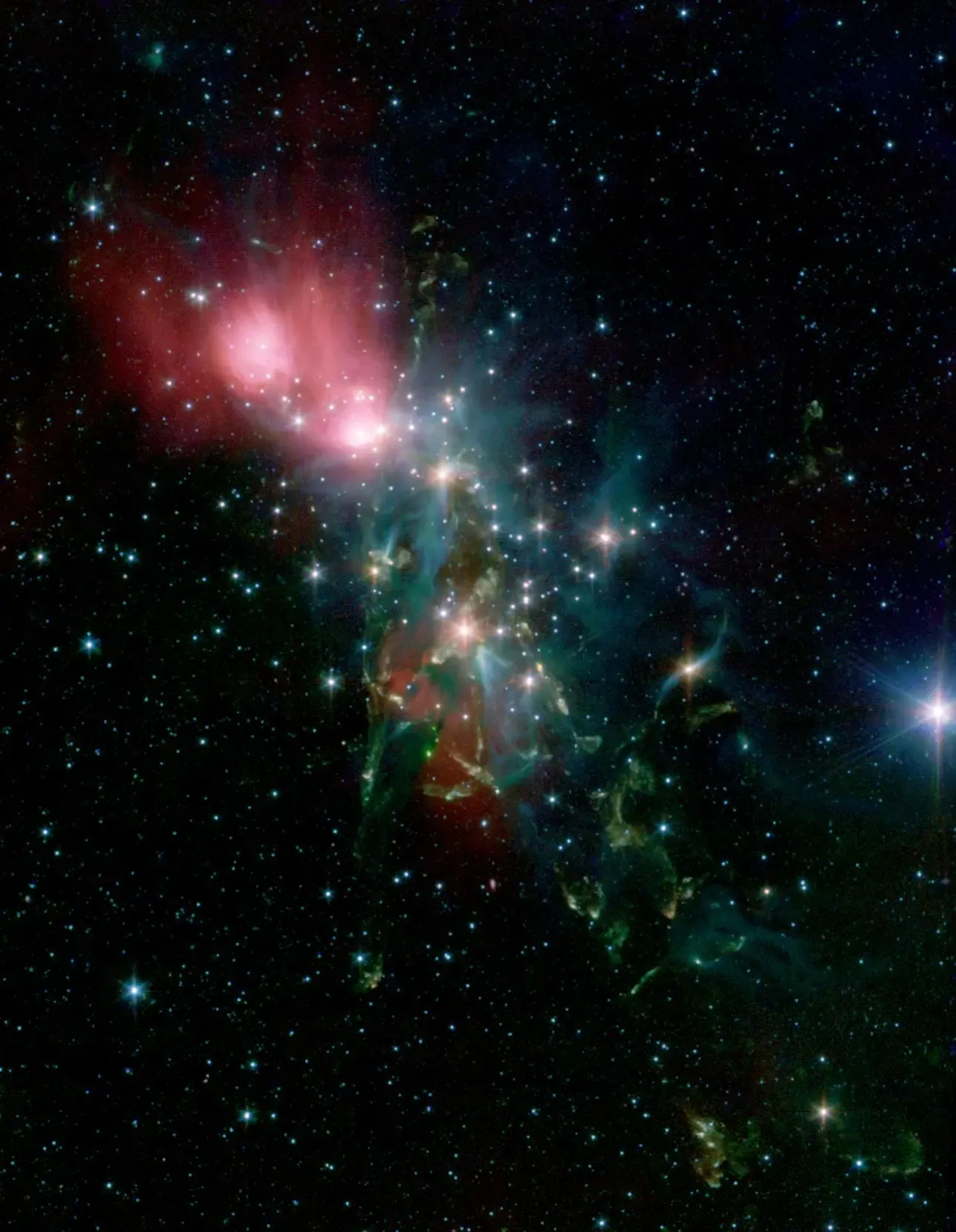 Nebulosa NGC 1333 fotografiada por el telescopio Spitzer de NASA
